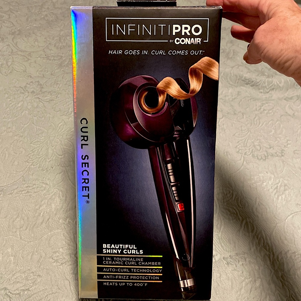 Conair InfinitiPro curl secret. In packaging and only used once.